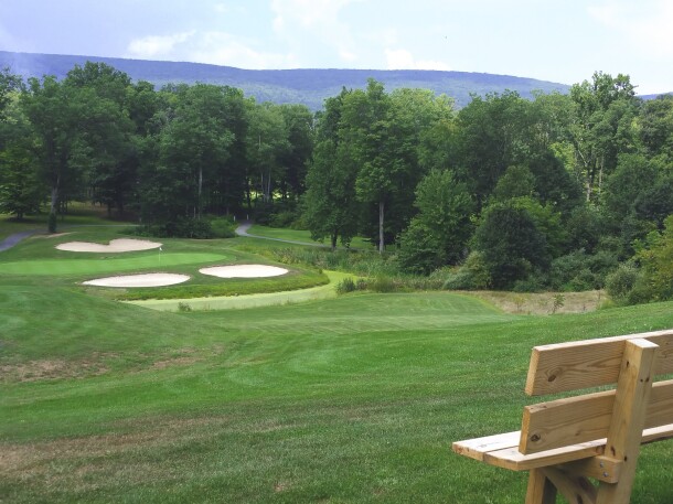 POV of Bench on golf course overlooking the golf course